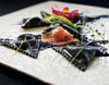 TRIANGOLI AL SALMONE REALE AFFUMICATO PESCATO ALL’AMO PROFUMATO AL LIMONE E ANETO IN SFOGLIA AL NERO DI SEPPIA  -  LEMON AND DILL SCENTED WILD “RED KING” SMOKED SALMON IN SEPIA INK BLACK SFOGLIA TRIANGLES Featured Image