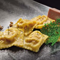 RAVIOLI ALLA MORTADELLA EMILIANA CON GRANELLA DI PISTACCHIO  -  EMILIAN MORTADELLA RAVIOLI AND PISTACHIOS Featured Image